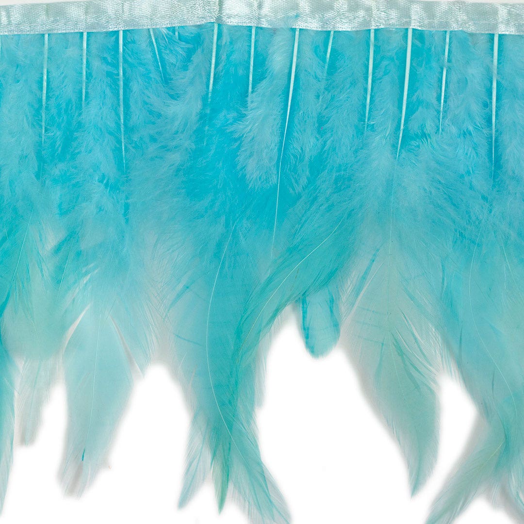 Rooster Saddle Fringe on Bias 6-8" x 1 YD-Light Turquoise